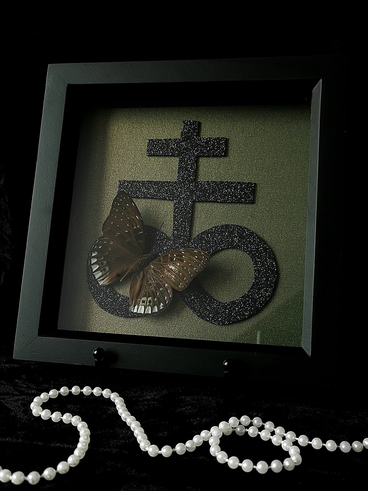 White edged constable butterfly frame with glitter Leviathon cross