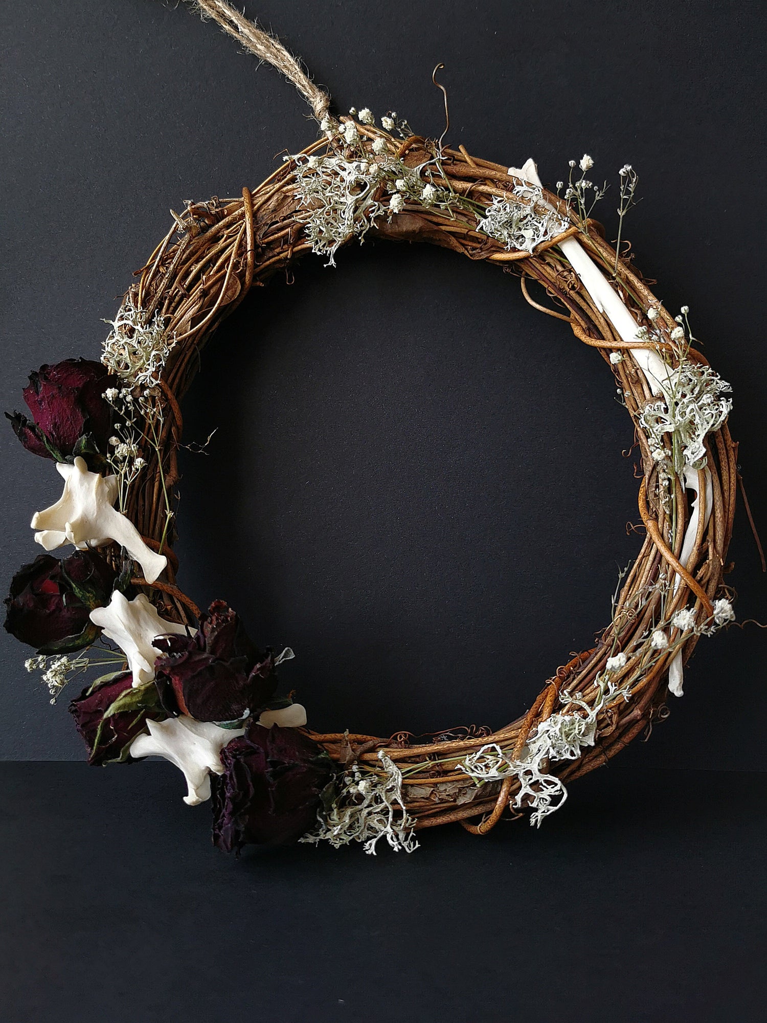 Dried flower and animal bone wreaths