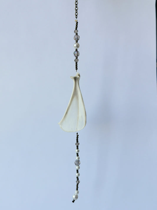 Animal bone suncatcher with grey and pearl beads