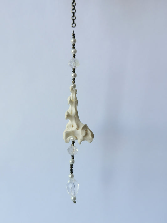 Animal bone suncatcher with pearl and clear beads