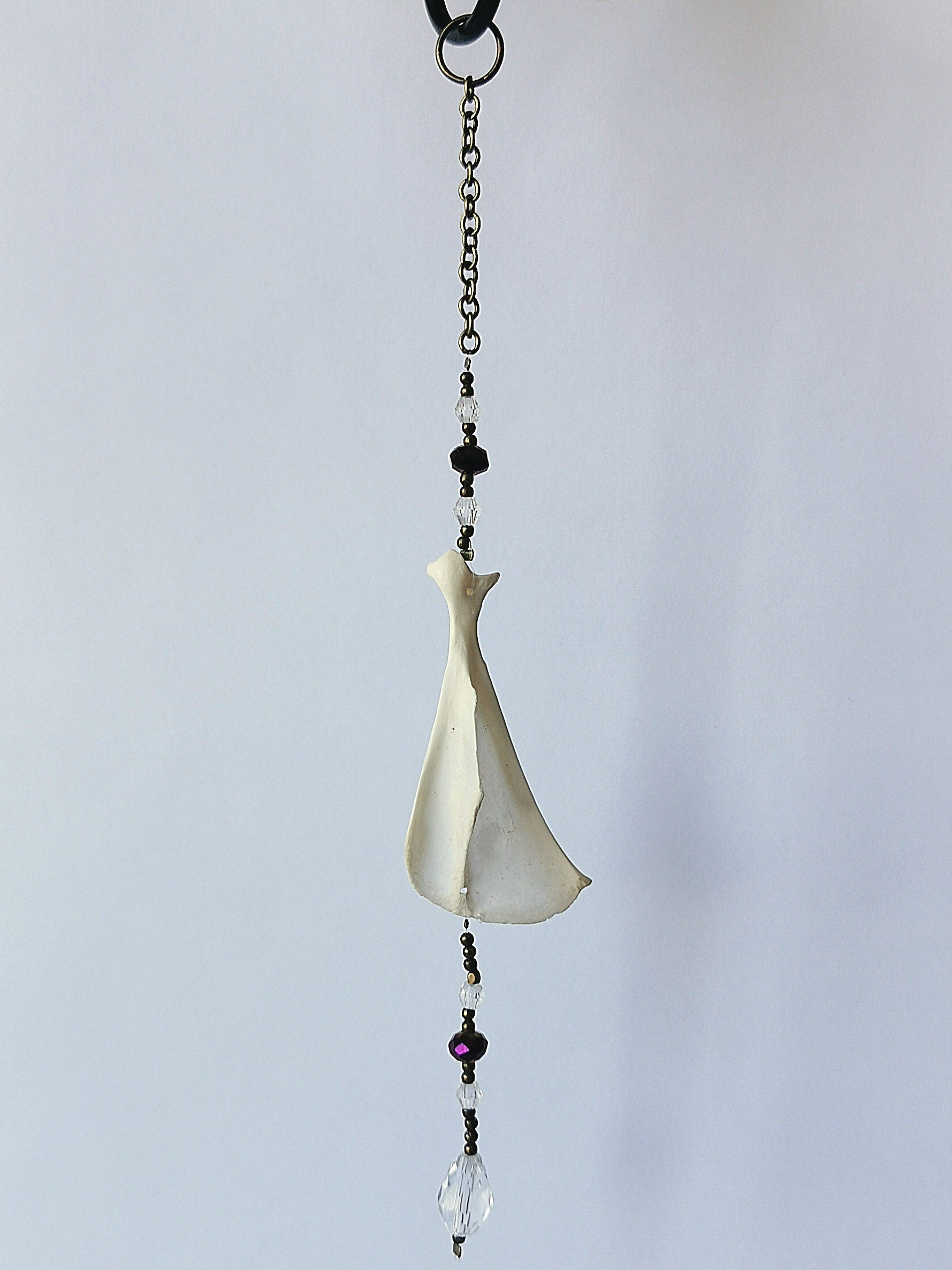 Animal bone suncatcher with clear and purple beads
